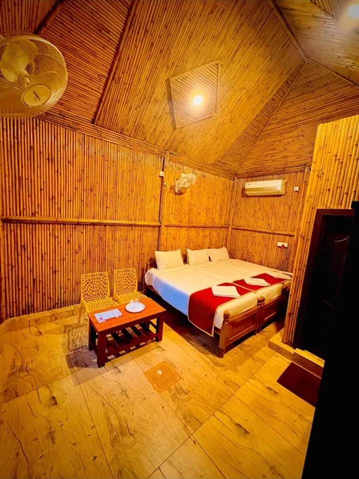 Bamboo cottage interior with two beds